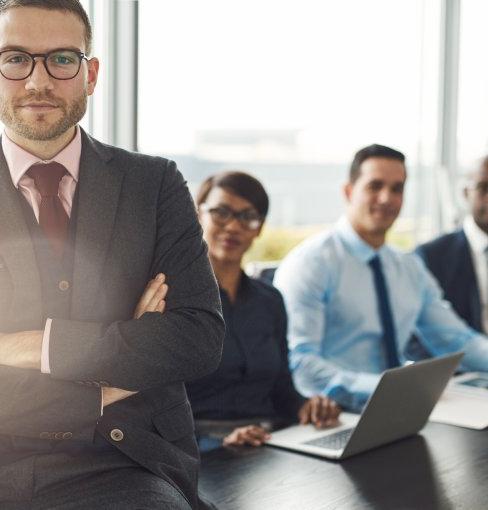 Professional sitting on desk